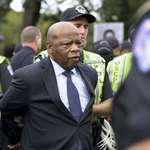 image for Rep. John Lewis being arrested along with 200 others for a sit-in protest outside the Capitol, 2013.