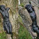 image for This sculpture of Jesus at abandoned cemetery in Poland gets slowly absorbed by a tree.
