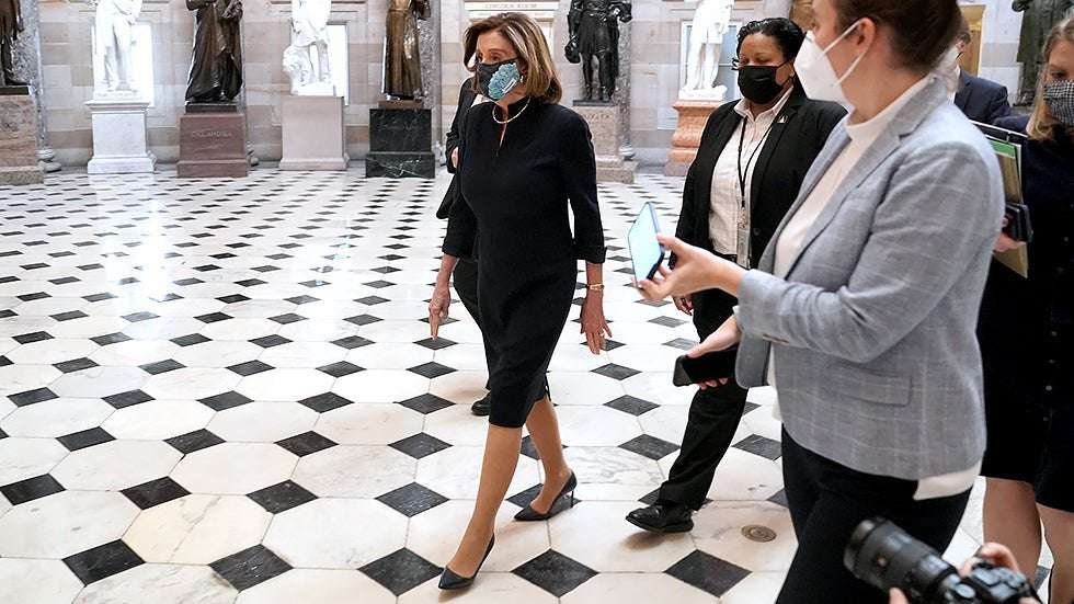 image for Pelosi announces lawmakers will be fined $5,000 if they bypass metal detectors to House floor