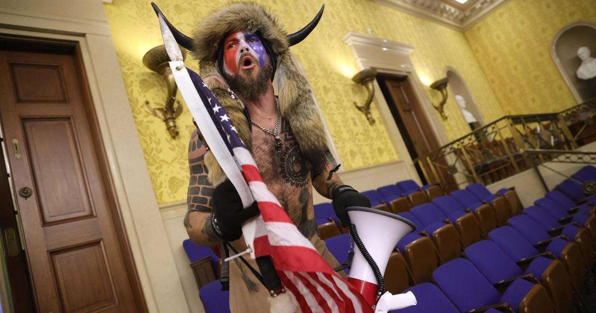 image for Capitol rioter known as "QAnon Shaman" will be jailed until trial