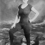 image for Annette Kellerman promoting a womanâ€™s right to wear a fitted, one-piece bathing suit in 1907. She was later arrested for indecency.