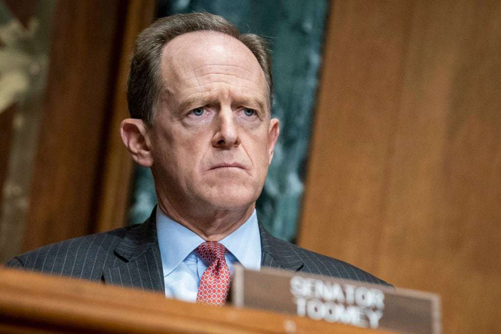 image for Pat Toomey Calls Trump's Upcoming Trial 'Constitutional,' Says QAnon Has No Place Within GOP