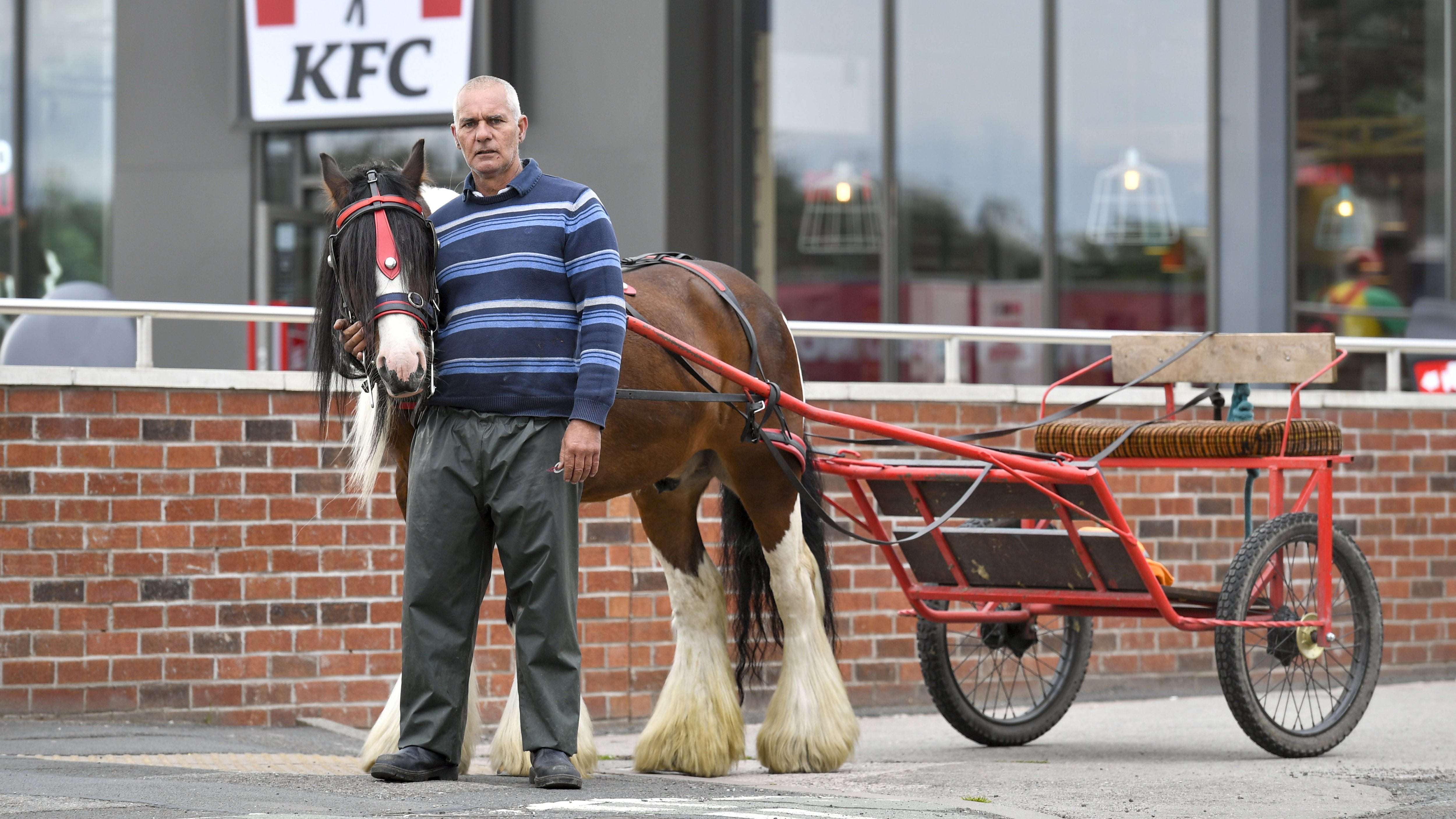 image for Man in horse-drawn carriage kicked out of KFC drive-thru