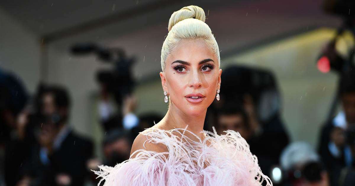 image for Lady Gaga offers $500,000 for return of dogs after thief steals them, shoots dog walker