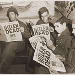 image for American soldiers reading about Hitler's death in the newspaper. The title alone takes up half a page.