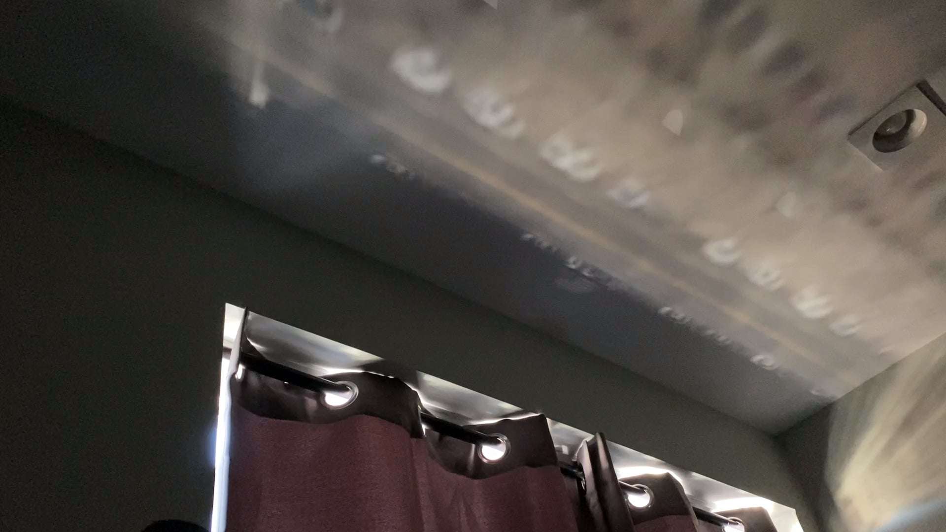 image for The curtains in my room create a "natural" pinhole camera that projects images of the street below onto my ceiling : woahdude