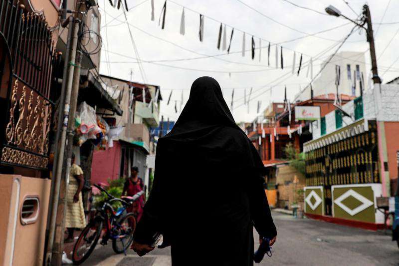image for Sri Lanka to ban burqa, shut many Islamic schools, minister says