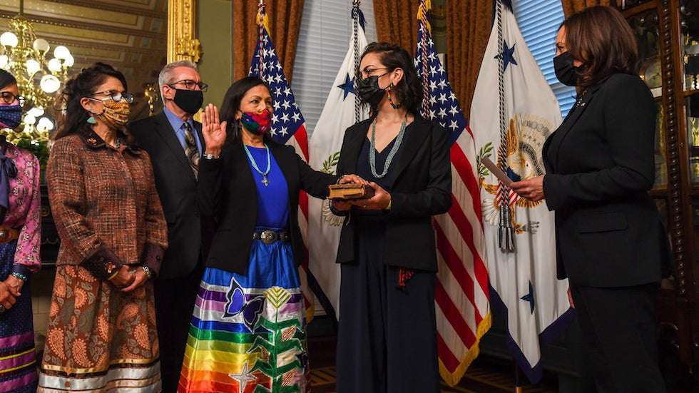 image for Haaland sworn in wearing traditional Native American skirt, moccasins