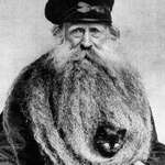 image for Louis Coulon In 1904, is well know for his 13 foot long beard which he used to hold his cats in