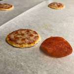 image for I made tiny pizzas the size of pepperonis.