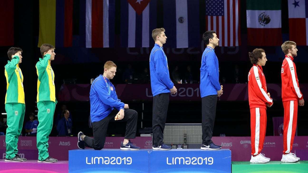 image for Raised fists, kneeling during anthem OK at U.S. Olympic trials