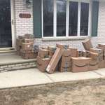 image for Man's wife saves all her Amazon purchase boxes from the past 2 years to place on her porch for her husband to come home and see this April 1.