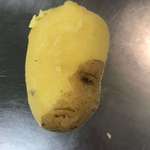 image for PsBattle: A partially peeled Yukon potato