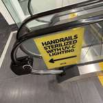 image for Airport escalator has automatically sterilized handrails (assuming because of covid)