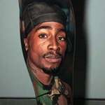 image for This Tupac tattoo is the most hyper realistic tattoo I have ever seen.
