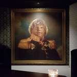image for This portrait of the late Chris Farley hanging in a Las Vegas steak house.