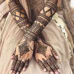 image for Stunning and absolutely symmetrical henna wedding design.