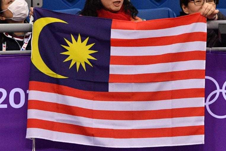 image for Malaysian flag mistaken for American flag with ISIS symbols leads to Kansas lawsuit