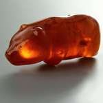 image for The "forbidden gummy bear". It is a 3500-year-old amber bear amulet and was found in a peat bog near Slupsk, Poland.