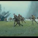 image for In 1917 (2019), Schofield is running along a trench, when another soldiers runs into him and trips him up. This was unscripted: an extra accidentally ran into George MacKay during a particular take, but McKay recovered and kept running.