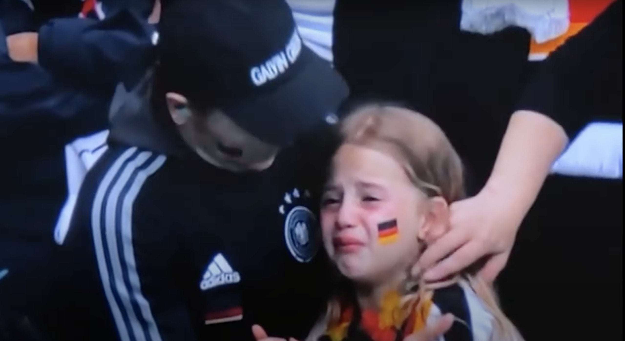 image for Over £25,000 has been raised for the crying German girl who was trolled during the Euros