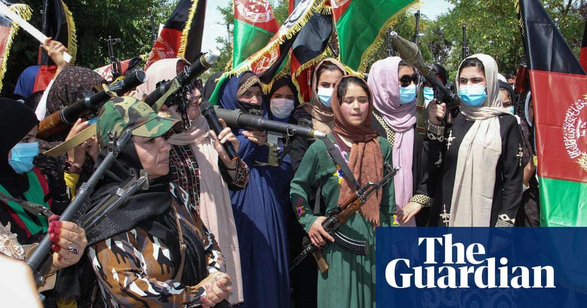 image for Armed Afghan women take to streets in show of defiance against Taliban