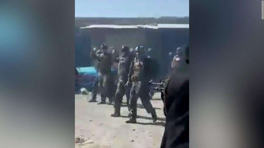 image for Taliban fighters execute 22 Afghan commandos as they try to surrender