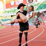 image for Tara Davis (long jump) with her boyfriend and Paralympian Hunter Woodhall (400m)
