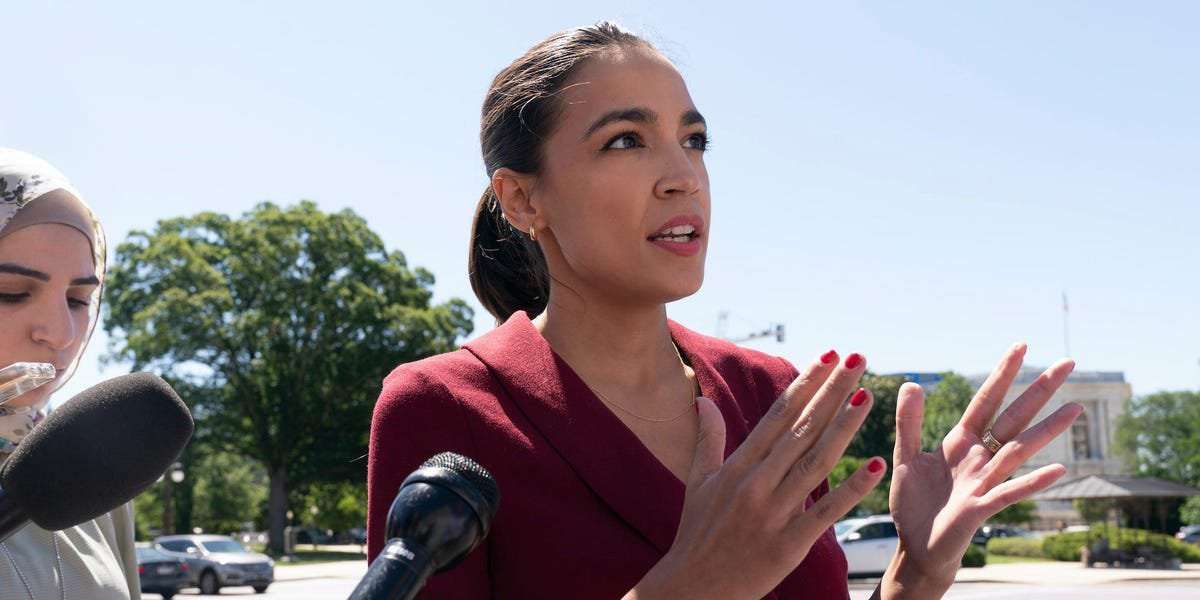 image for AOC says communities 'can't out-organize' voter suppression and warns the 'ground is being set to overturn results'