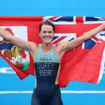 image for Flora Duffy after winning the FIRST EVER gold medal for Bermuda in the triathlon