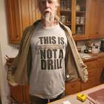 image for My dad, a retired carpenter, wearing his dad-liest shirt