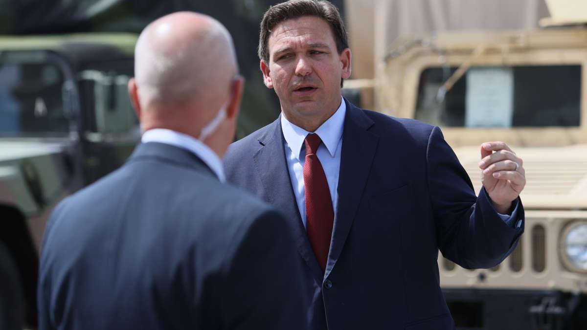 image for Florida Accounts for 1 in 5 New COVID Cases as DeSantis Sells Anti-Fauci Shirts