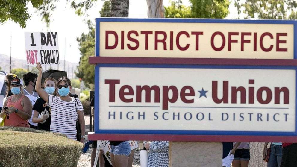 image for Phoenix Union high schools tells students to mask up, despite Arizona's statewide ban