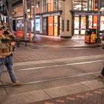image for An American terrorist aims his rifle at a journalist — Portland 2021