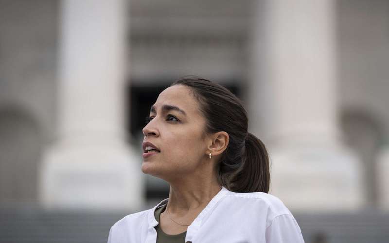 image for AOC Says It's 'Absolutely Wild' Members of Congress Can Buy and Sell Stocks
