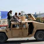 image for Taliban fighters patrolling in an American taxpayer paid Humvee