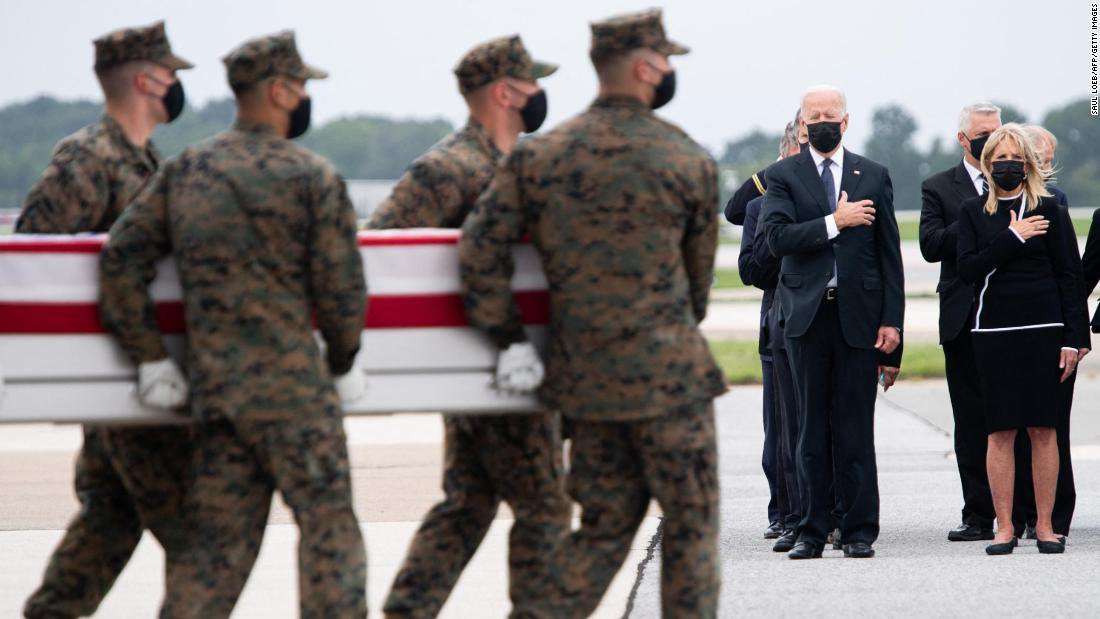 image for Fact check: Conservative tweeters falsely claim Biden didn't show up at Dover to honor troops' remains