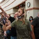 image for Anti-mask + anti-vaccine activists attend a local American school board meeting