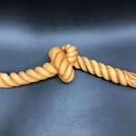 image for Carved a rope and knot from basswood