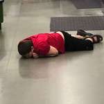image for Someone’s unattended kid kissing the floor in Walmart. This is why aliens don’t come here.