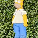 image for I fashioned a Homer Simpson out of wood and stuck it in my bush