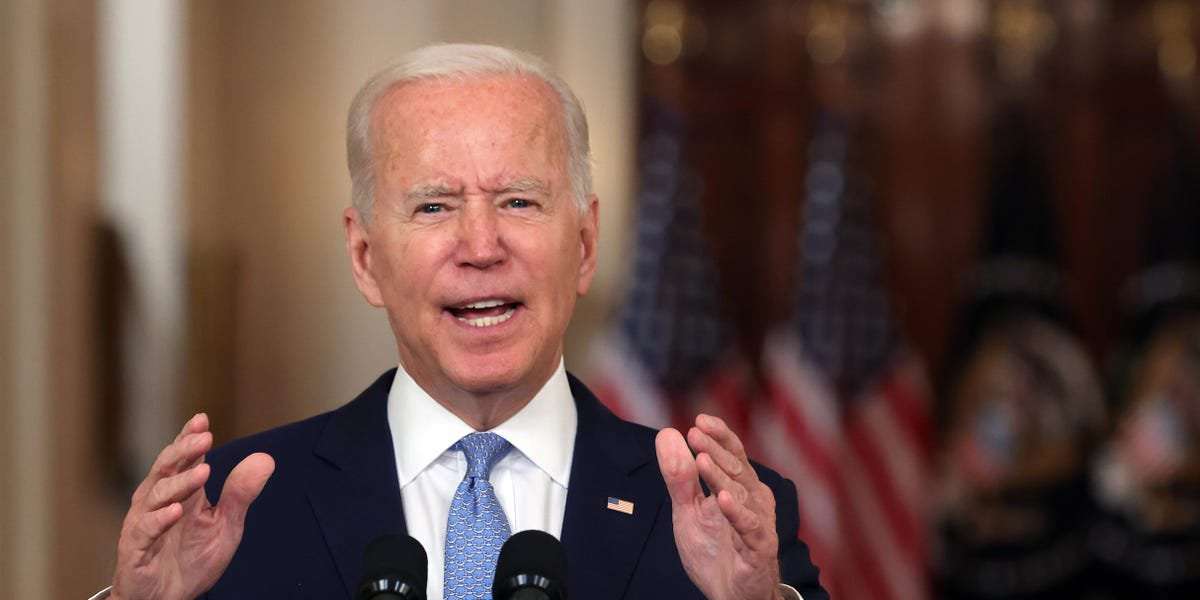 image for The federal government will restore '100%' of pay to any school officials who are punished for defying state mask-mandate bans, Biden says