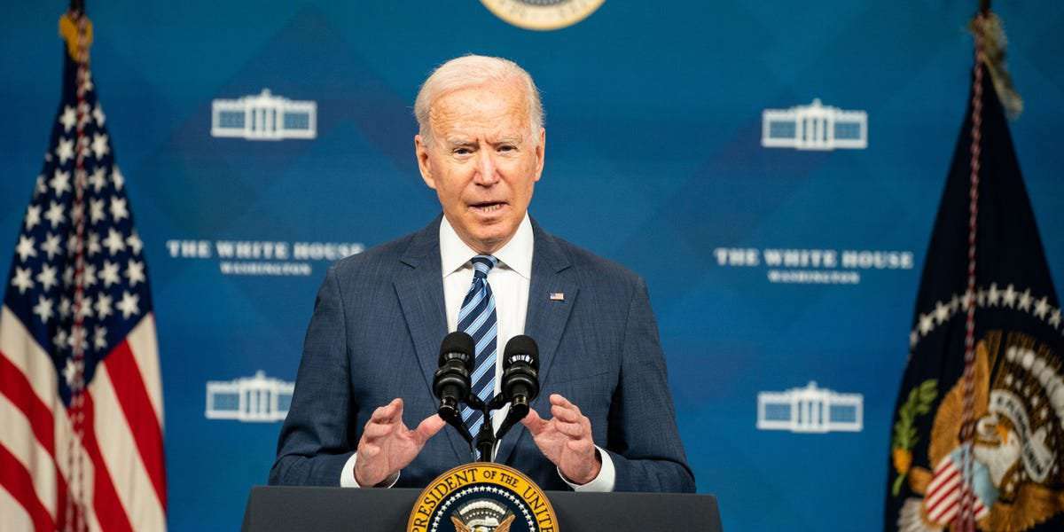 image for The Biden administration will require employers with more than 100 employees to mandate vaccines or weekly testing