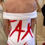 image for AOC is at the Met Gala. The back of her dress reads "TAX THE RICH."