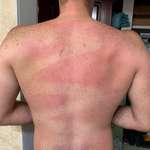 image for Wife helped spray sunscreen on my back…