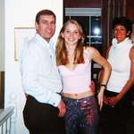 image for Ghislaine Maxwell with Prince Andrew and Virginia Roberts Giuffre at her London home in March 2001