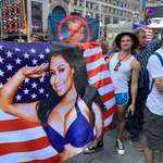 image for Nicki Minaj flag at an anti-vax rally.