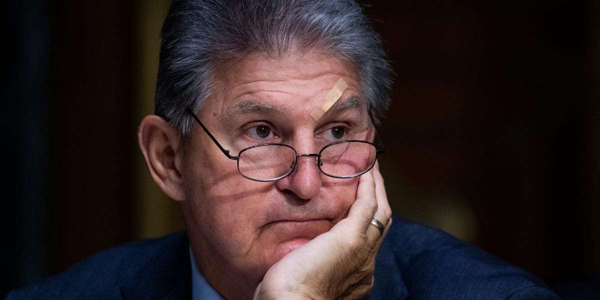 image for Joe Manchin, who is holding up crucial climate change initiatives in Biden's reconciliation bill, collects $500,000 a year from coal stocks dividends: report