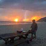 image for My friend making tacos in a lightning storm on the California coast last night