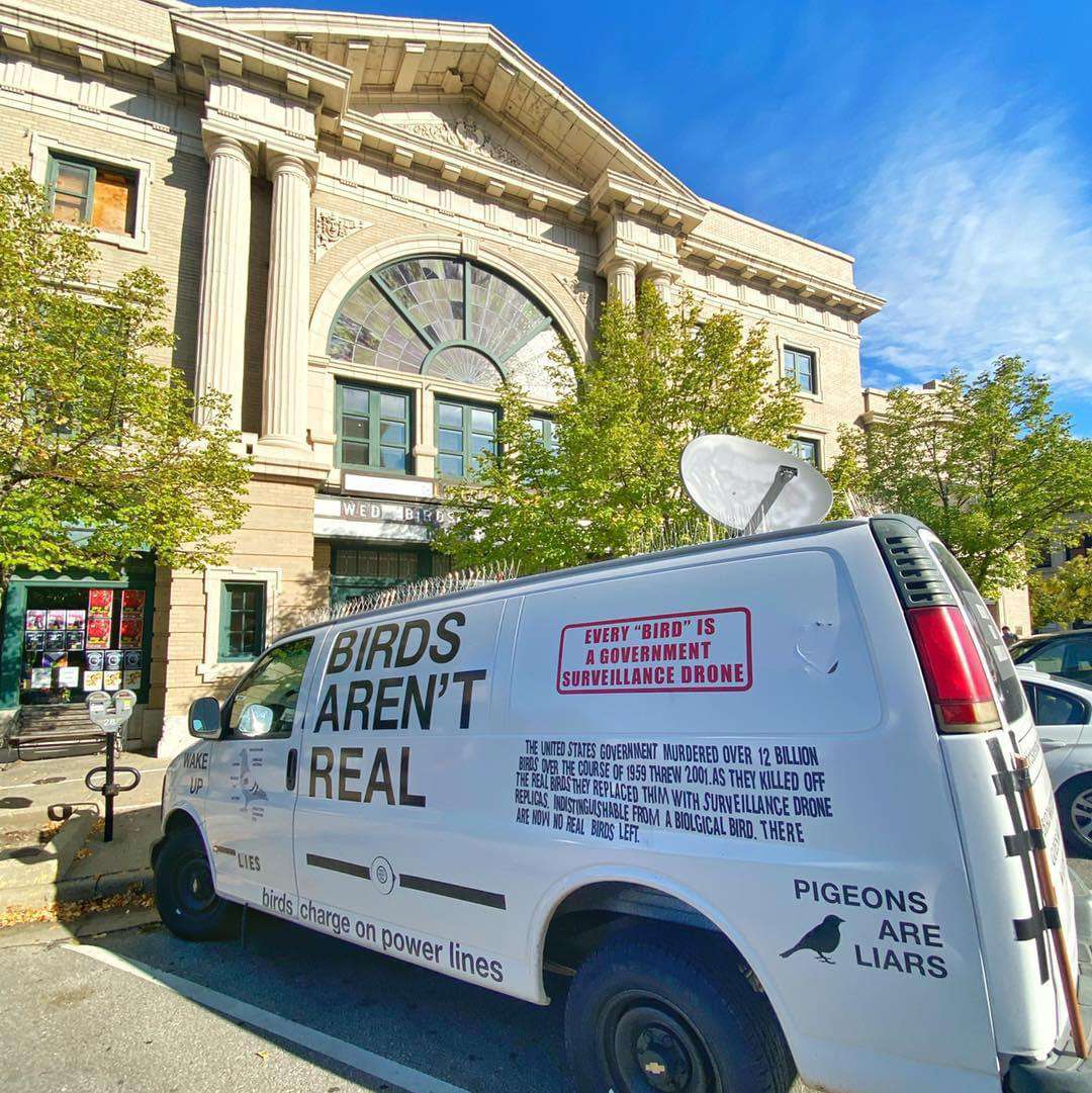 image showing “Birds aren’t real” conspiracy theory van parked in Lawrence, Kansas